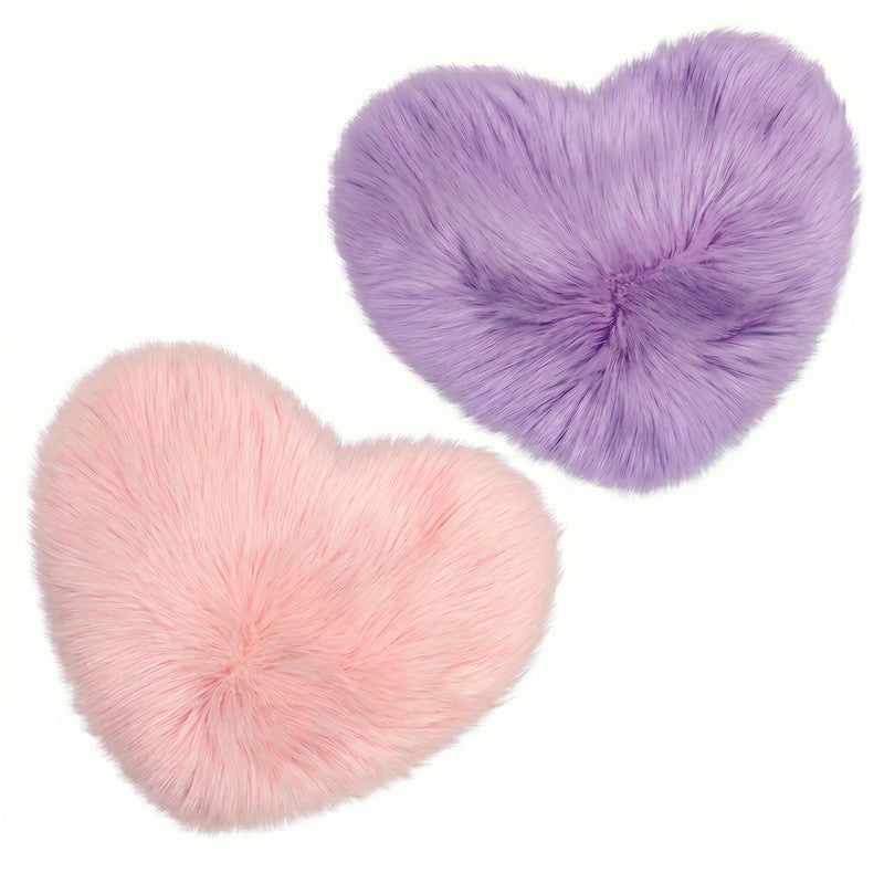 Rose red double attached heart shaped faux fur rug on a white background