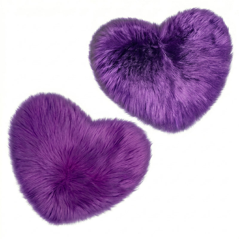 Rose red double attached heart shaped faux fur rug on a white background