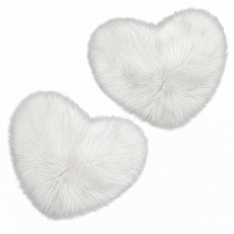 Rose red double attached heart shaped faux fur rug on a white background