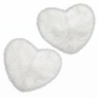Rose red double attached heart shaped faux fur rug on a white background