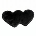 Rose red double attached heart shaped faux fur rug on a white background
