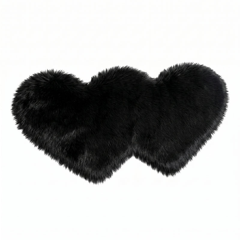 Rose red double attached heart shaped faux fur rug on a white background