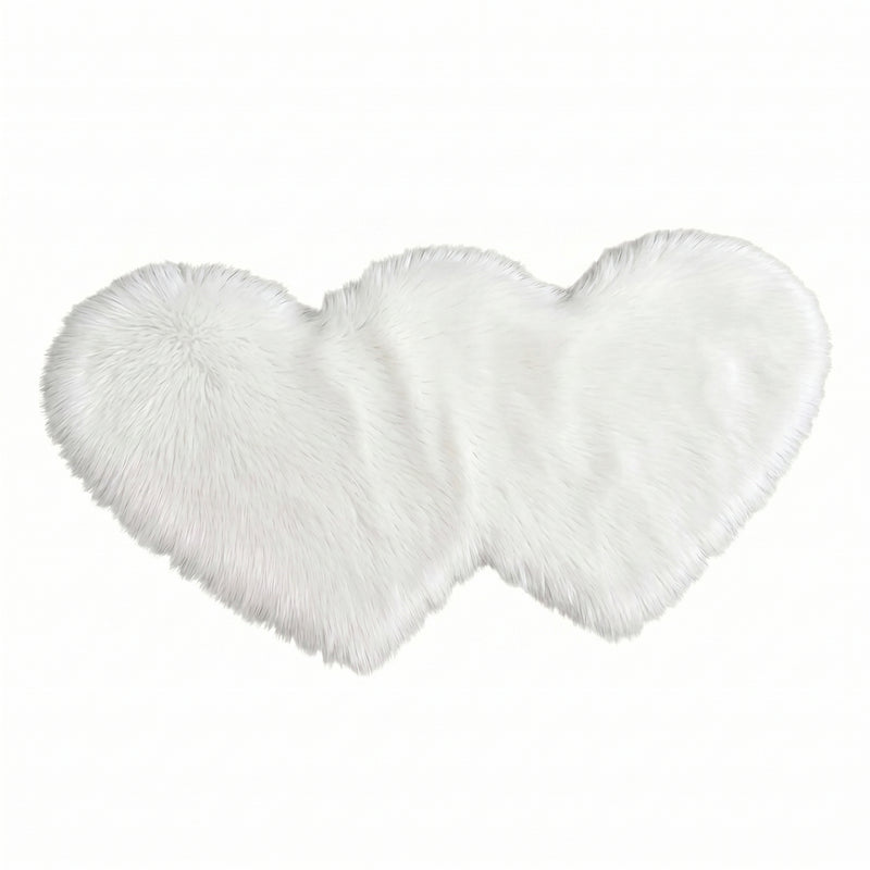 Rose red double attached heart shaped faux fur rug on a white background