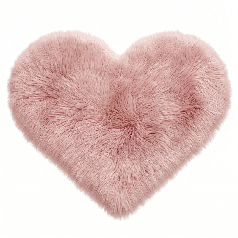 Rose red double attached heart shaped faux fur rug on a white background