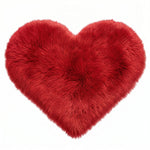 Rose red double attached heart shaped faux fur rug on a white background