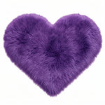 Rose red double attached heart shaped faux fur rug on a white background