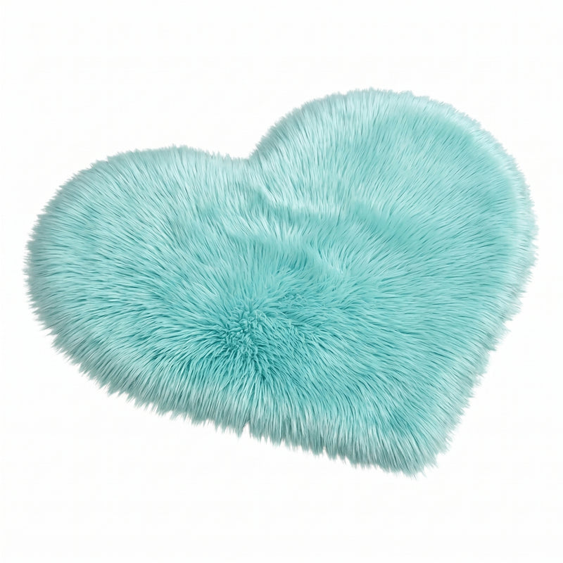 Rose red double attached heart shaped faux fur rug on a white background