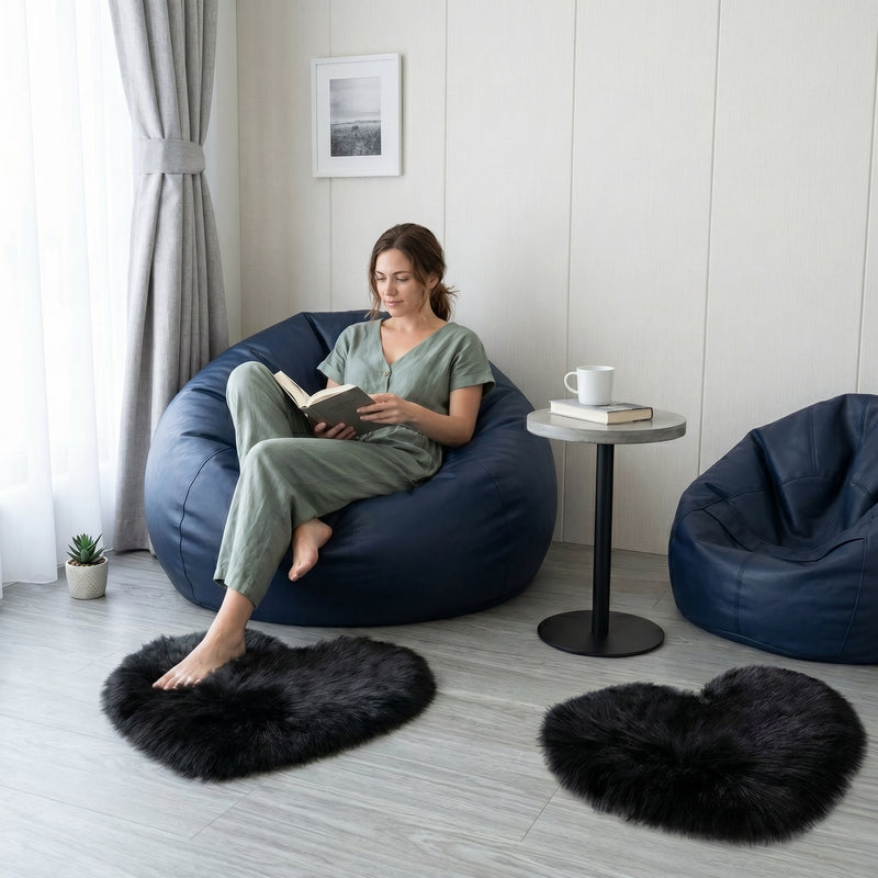 Pink heart shaped faux fur rug on a wood bedroom floor beside a bed