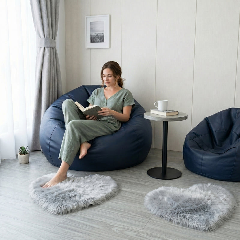 Pink heart shaped faux fur rug on a wood bedroom floor beside a bed
