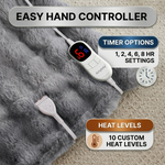 LED hand controller on the faux fur throw showing adjustable heat levels and 1-8 hour auto-off timer settings