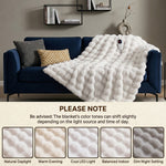 Woman in bed holding the heated blanket's controller next to a color-variance disclaimer and fabric swatch samples