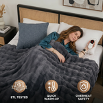 Woman sleeping in bed wrapped in the white heated throw with ETL tested, quick warm-up, and overheat safety icons
