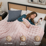 Woman sleeping in bed wrapped in the white heated throw with ETL tested, quick warm-up, and overheat safety icons