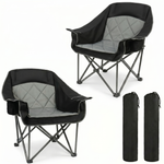 Black oversized folding camping chair with orange trim shown with two rolled carry bags on a white background