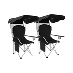Black oversized folding camping chair with orange trim shown with two rolled carry bags on a white background