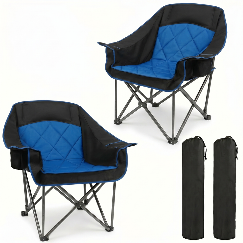 Black oversized folding camping chair with orange trim shown with two rolled carry bags on a white background