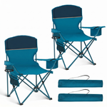 Black oversized folding camping chair with orange trim shown with two rolled carry bags on a white background