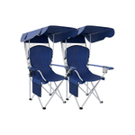 Black oversized folding camping chair with orange trim shown with two rolled carry bags on a white background