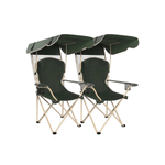 Black oversized folding camping chair with orange trim shown with two rolled carry bags on a white background