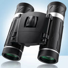 High-powered binoculars with night vision, black, shown with carrying case and lens caps