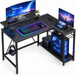 L-shaped gaming desk with LED lighting - multiple monitors and a PC setup