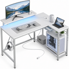 L-shaped gaming desk with LED lighting - multiple monitors and a PC setup