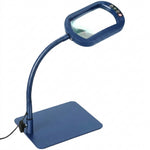 Black 10X LED magnifying lamp shown in base-mount and clamp-mount setups with USB power adapter