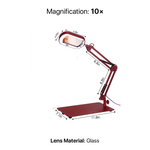Diagram of the black LED magnifying lamp showing 10-inch arm segments, 7.35-inch base, and 10X glass lens