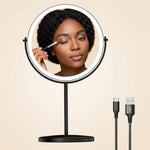 Rechargeable LED makeup mirror in chrome with lit ring light and touch control, front view