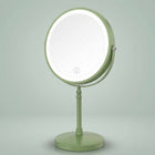 Rechargeable LED makeup mirror in chrome with lit ring light and touch control, front view