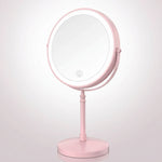 Rechargeable LED makeup mirror in chrome with lit ring light and touch control, front view