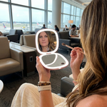 Comparison graphic showing the LED travel makeup mirror's auto-sensor lighting versus a manual-switch mirror