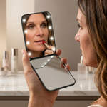 Feature diagram of the LED travel makeup mirror showing its 180-degree hinge and battery compartment