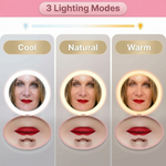 Close-up of a woman applying lipstick using the lit LED travel makeup mirror