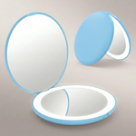 LED travel makeup mirror in pink, shown closed and open with LED lights on