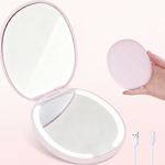 LED travel makeup mirror in pink, shown closed and open with LED lights on
