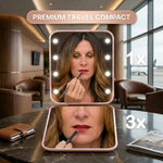 Pink LED travel makeup mirror being carried in a pocket, showing its compact size