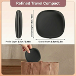 Pink LED travel makeup mirror being carried in a pocket, showing its compact size
