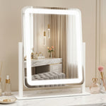 White LED vanity mirror with edge lighting and attached 20X magnifier on a marble vanity table
