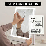 Hands attaching the magnetic 20X magnifier to the LED vanity mirror surface