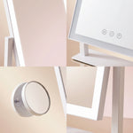 Close-up detail of the mirror frame, touch control icons, and magnetic magnifier