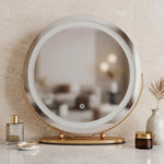 White LED vanity mirror with halo light ring, shown from the front on an oval base with ball-joint hinges
