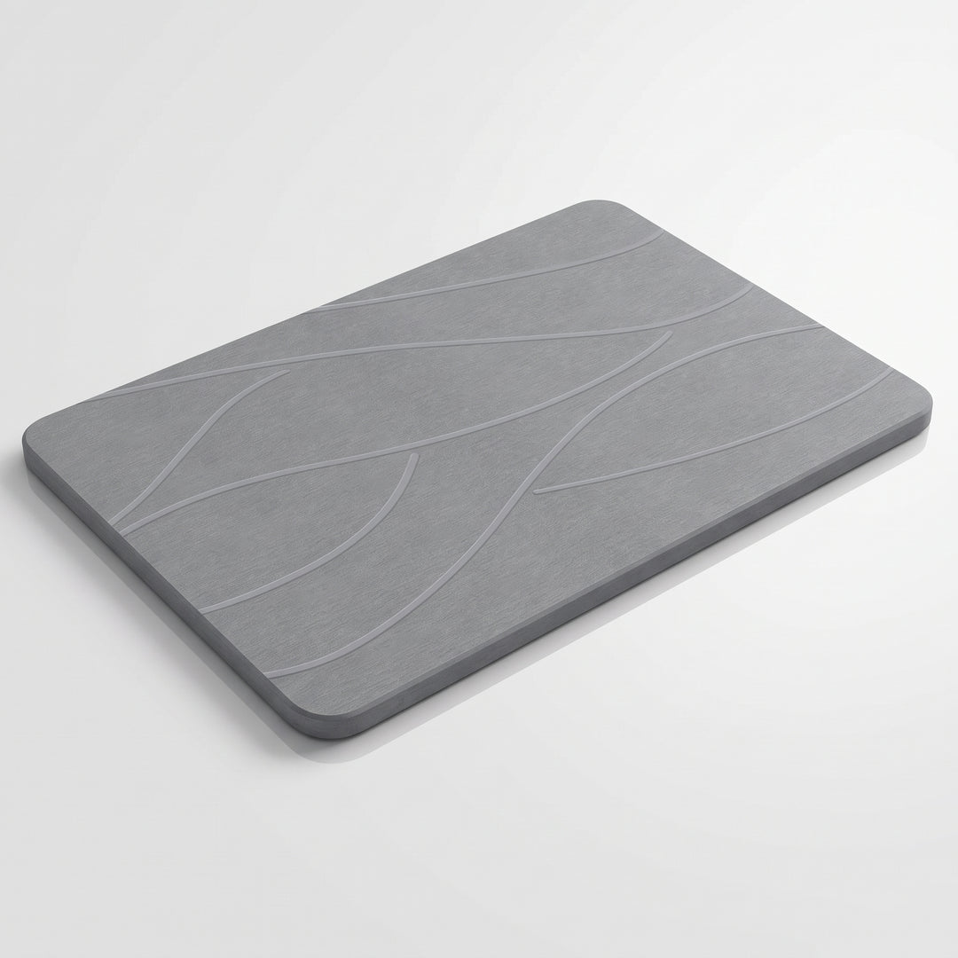 Line stone bath mat with a curved line pattern on a clean background