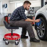Person detailing a grey car beside the rolling mechanic stool with five swivel casters