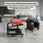 Person in grey coveralls sitting on the rolling mechanic stool while working on a car wheel