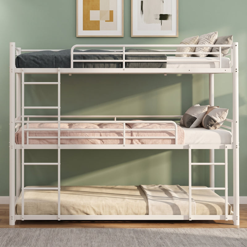 Black full-over-full metal bunk bed with ladder and guardrails in a styled bedroom