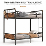 Black full-over-full metal bunk bed with ladder and guardrails in a styled bedroom