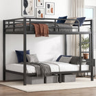 Black full-over-full metal bunk bed with ladder and guardrails in a styled bedroom
