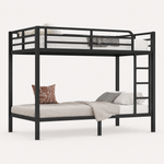 Black full-over-full metal bunk bed with ladder and guardrails in a styled bedroom