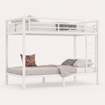 Black full-over-full metal bunk bed with ladder and guardrails in a styled bedroom
